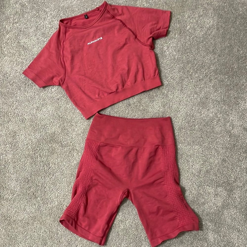 Alphalete biker shorts and matching crop top. New condition. Can sell separately